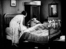 The Pleasure Garden (1925)Carmelita Geraghty, Virginia Valli and bed
